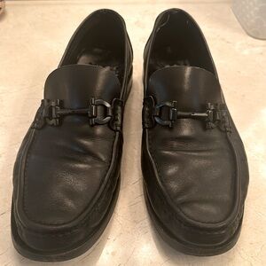 Salvatore Ferragamo Loafers . Black on black.